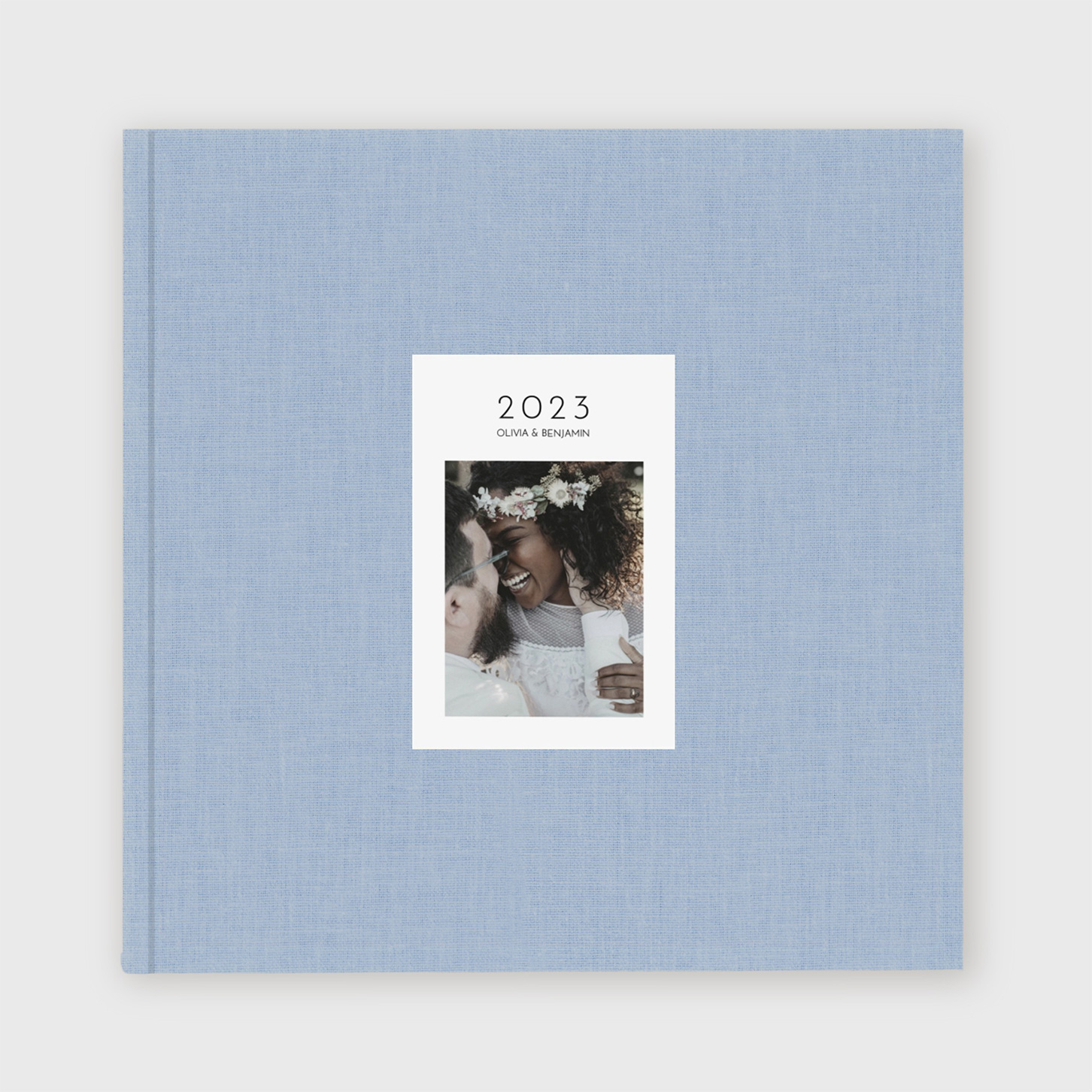 Livre photo couverture tissu photo embossée